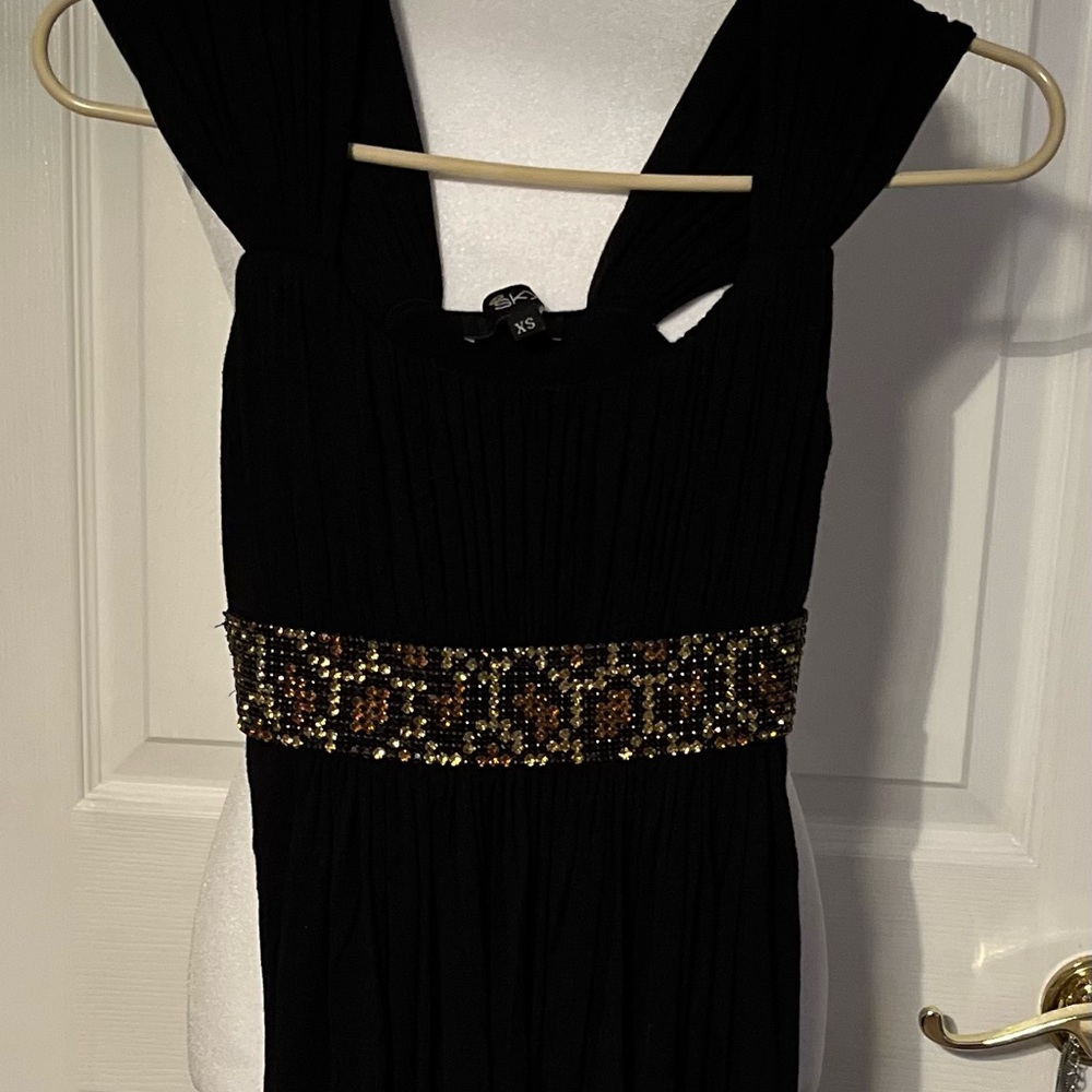 Elegant Black Dress with Gold Accents